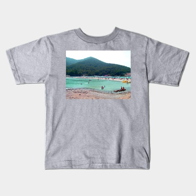 Cala Llonga Beach Kids T-Shirt by tomg